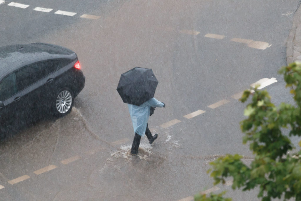 Pėstieji per lietų